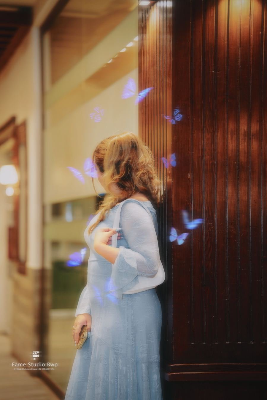 Creative bridal portrait with butterfly effects
